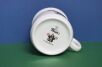 Dół kubka dla dzieci z  krecikiem i logiem Porcelán Thun

