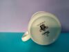 Dół kubka dla dzieci z  krecikiem i logiem Porcelán Thun
