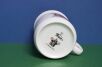Dół kubka dla dzieci z  krecikiem i logiem Porcelán Thun
