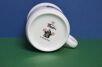 Dół kubka dla dzieci z  krecikiem i logiem Porcelán Thun