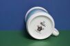 Dół kubka dla dzieci z  krecikiem i logiem Porcelán Thun

