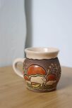 Ceramiczny kubek z grzybami