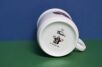 Dół kubka dla dzieci z  krecikiem i logiem Porcelán Thun
